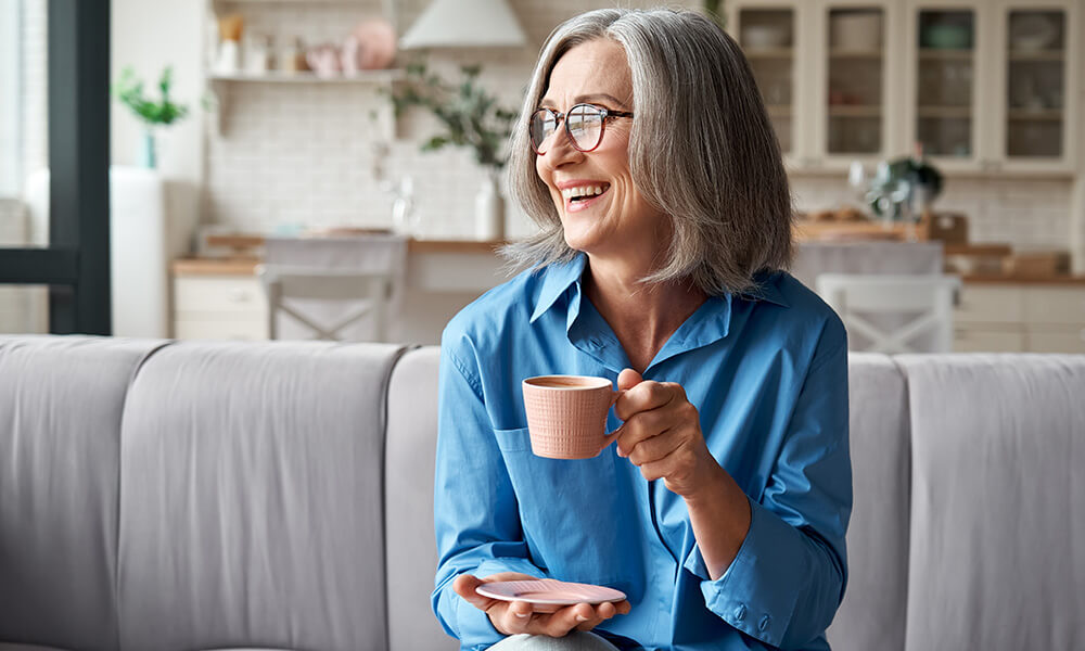 Older Woman Having Coffee Happy